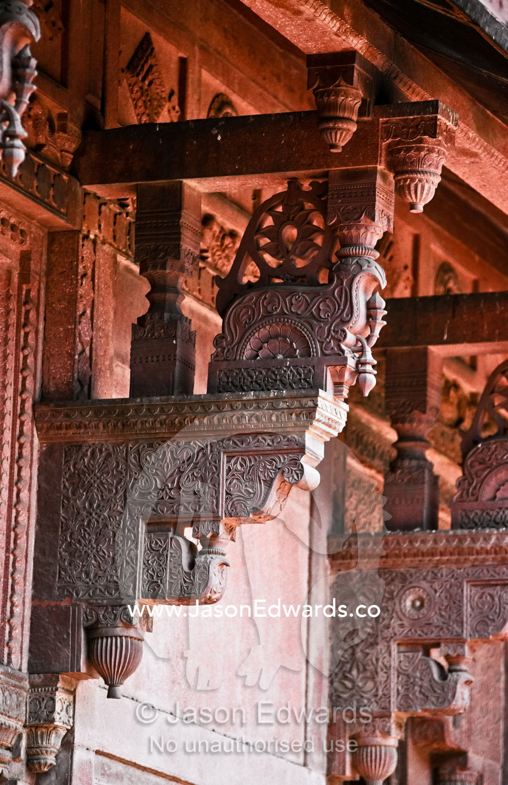 Carved sandstone lattice work in the the Lal Quila, aka Red Fort. Lal Quila, Red Fort, Delhi, India.