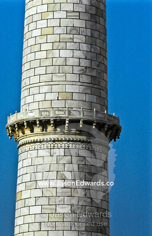 A balcony on a marble minaret by the mausoleum at the Taj Mahal. Agra, Uttar Pradesh, India.