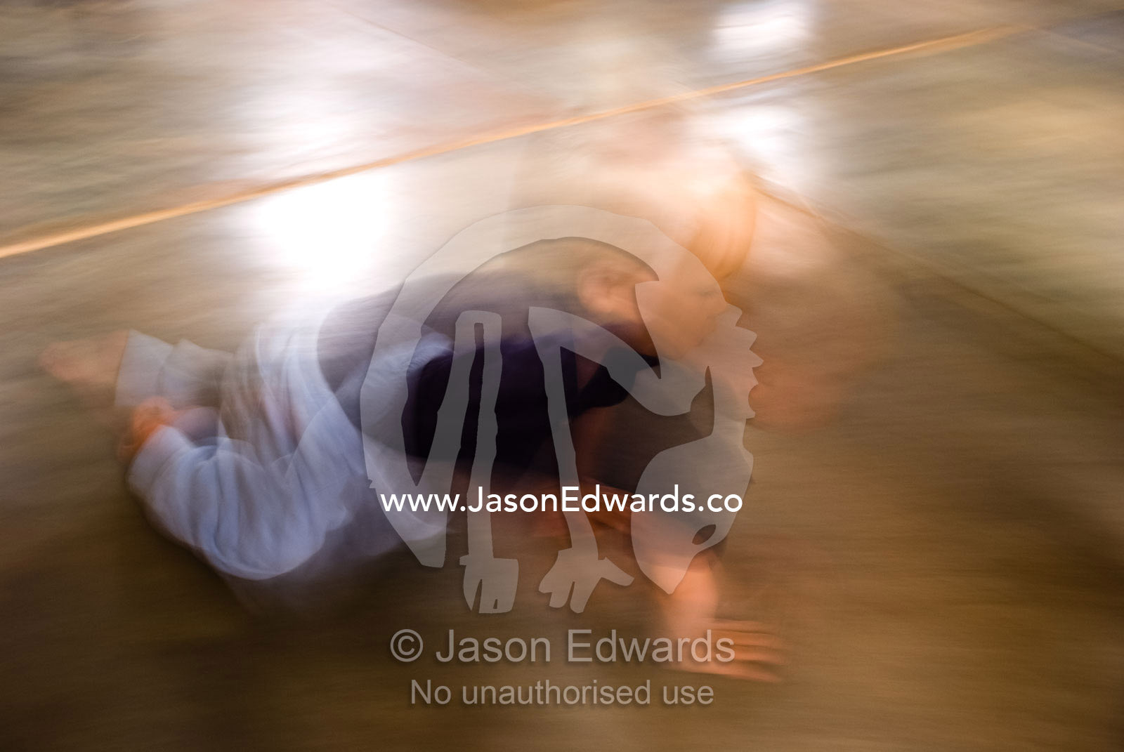 A baby scurries across the floor of a desert roadhouse in the Outback. New South Wales, Australia.