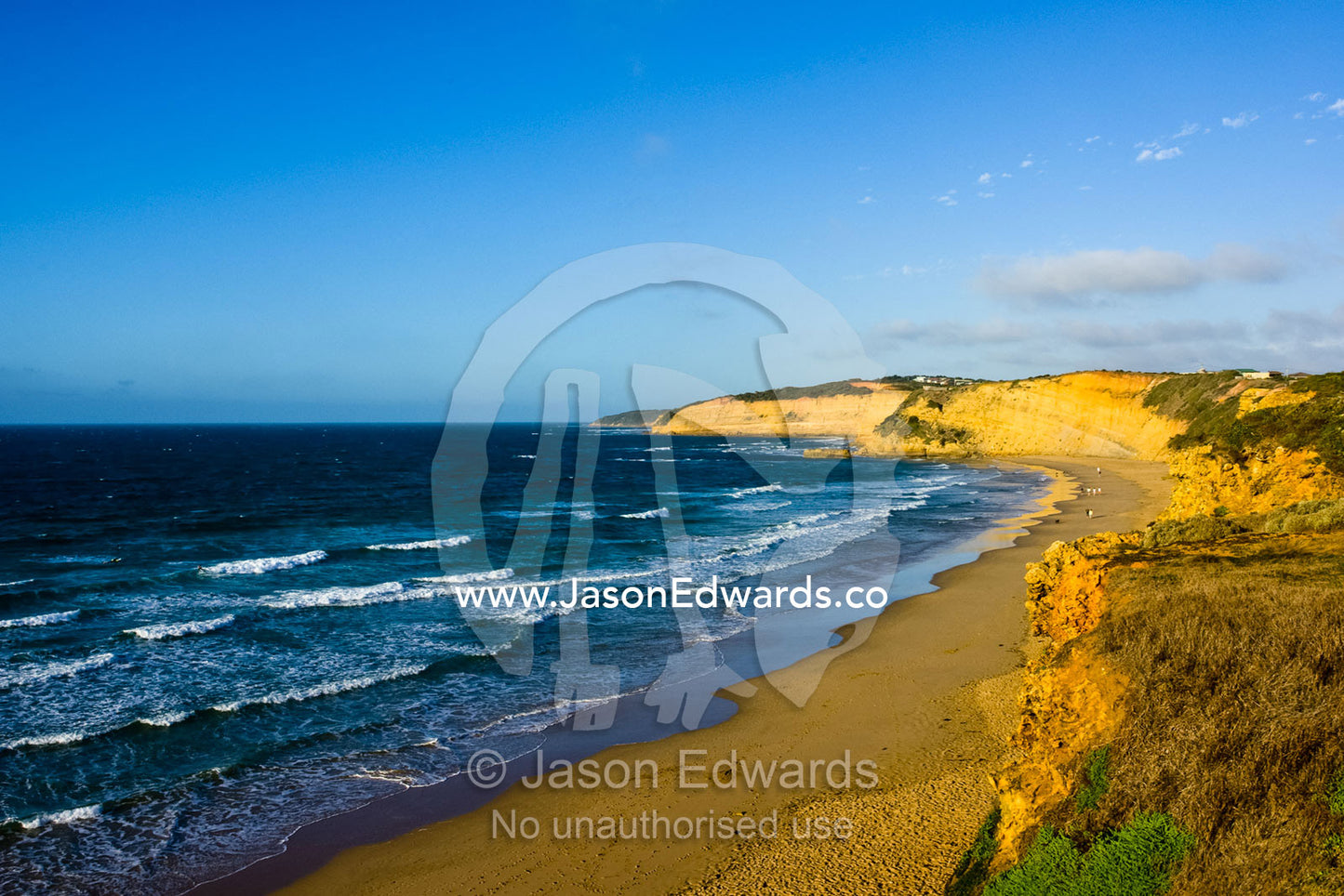 Dawn catches the long, winding sandstone cliffs of the Surf Coast. Jan Juc, Surf Coast, Victoria, Australia.