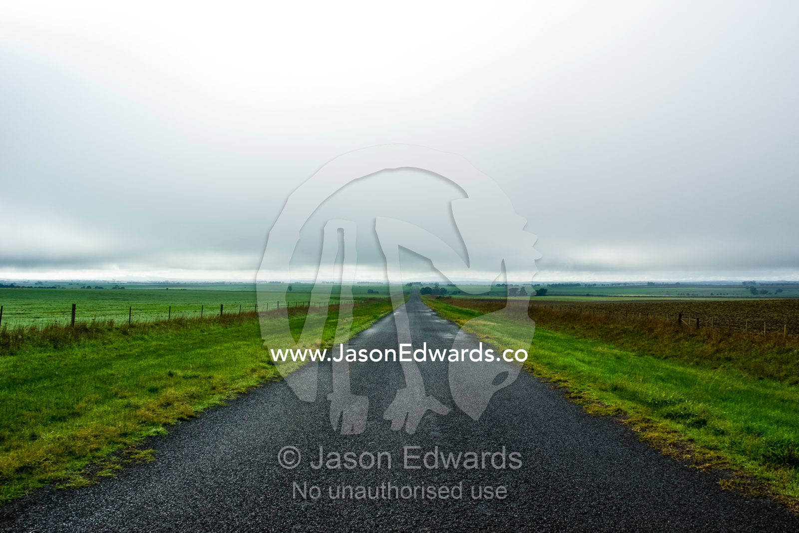 A cold winters day on a forlorn country road in the middle of nowhere. near Basalt, Daylesford District, Victoria, Australia.