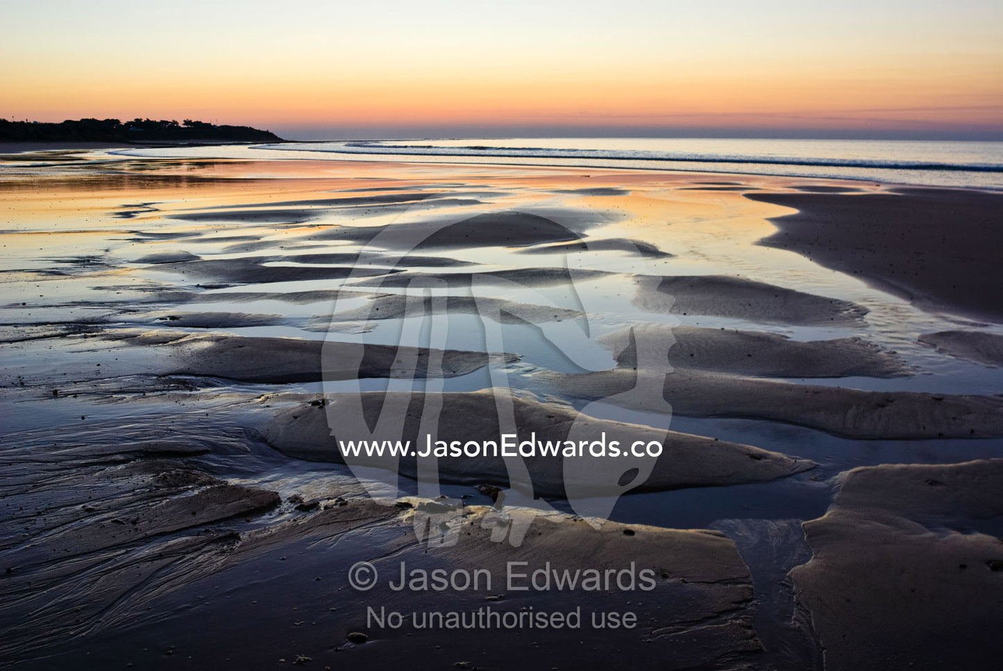 Tide pools reflect dawn's first light. Point Danger, Torquay, Surf Coast, Victoria, Australia.