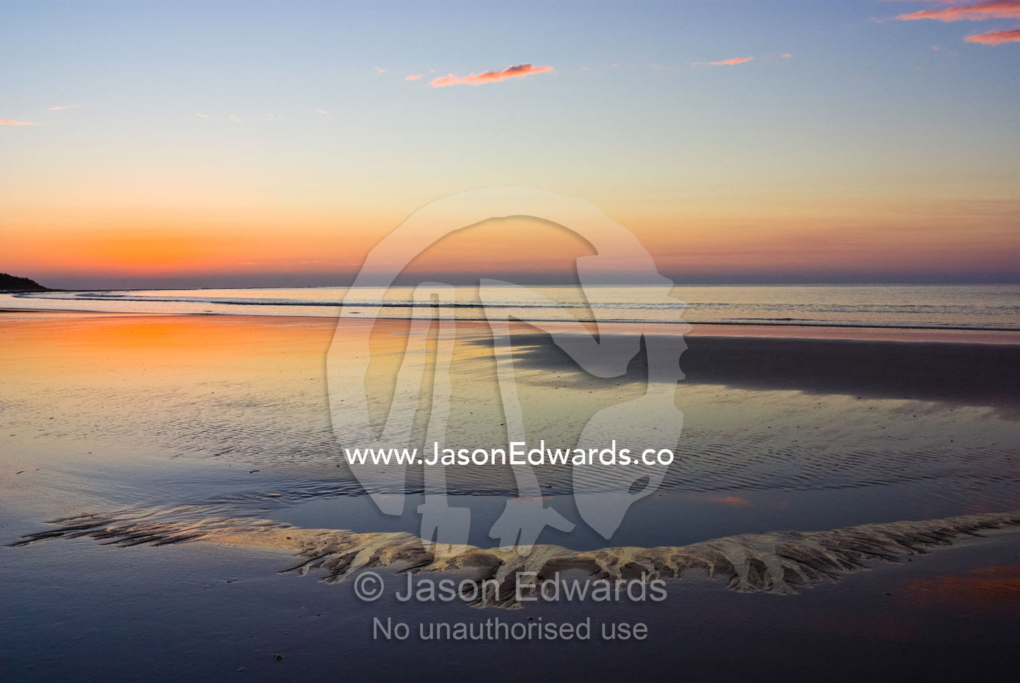 Tide pools reflect dawn's first light. Point Danger, Torquay, Surf Coast, Victoria, Australia.