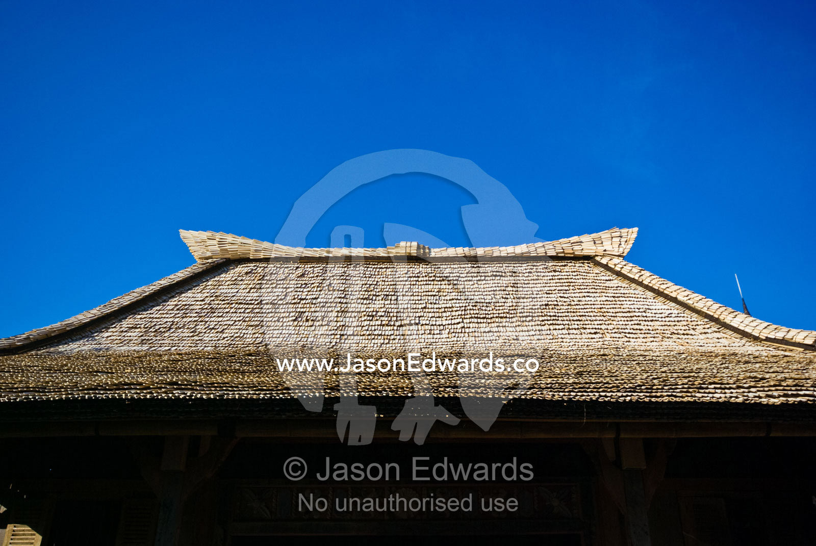 An ancient and rare style of bamboo tiled roof on an exclusive villa. The Temple Lodge, Bukit Peninsula, Bali, Indonesia.