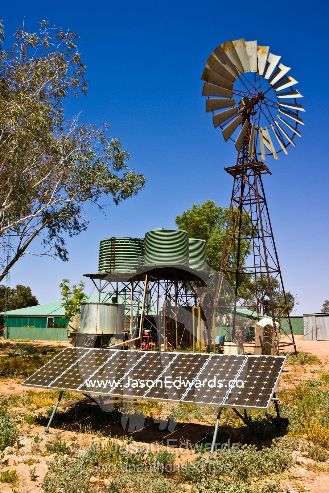 Solar panels provide electricity for desert homes and windmills water. Sturt National Park, New South Wales, Australia.