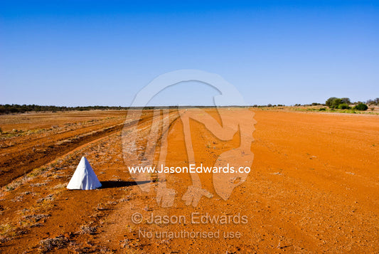 White cones mark the boundary of an outback desert airstrip for pilots Sturt National Park, New South Wales, Australia.