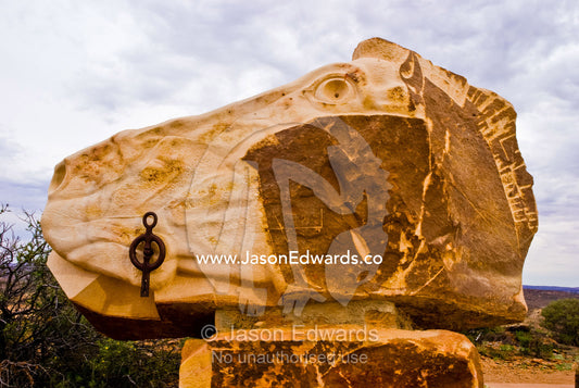 A stone sculpture carved into the form of a horse head in the desert. Living Desert Flora and Fauna Sanctuary, Barrier Ranges, Broken Hill, New South Wales, Australia.