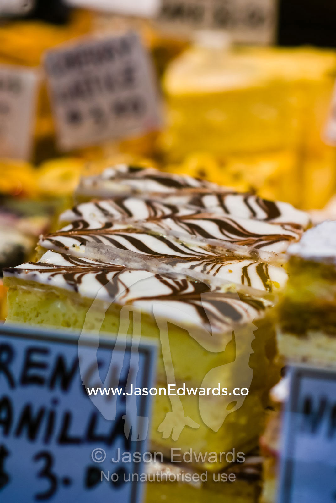 Delicious french vanilla slices for sale in a patisserie in a market. Queen Victoria Markets, Melbourne, Victoria, Australia.