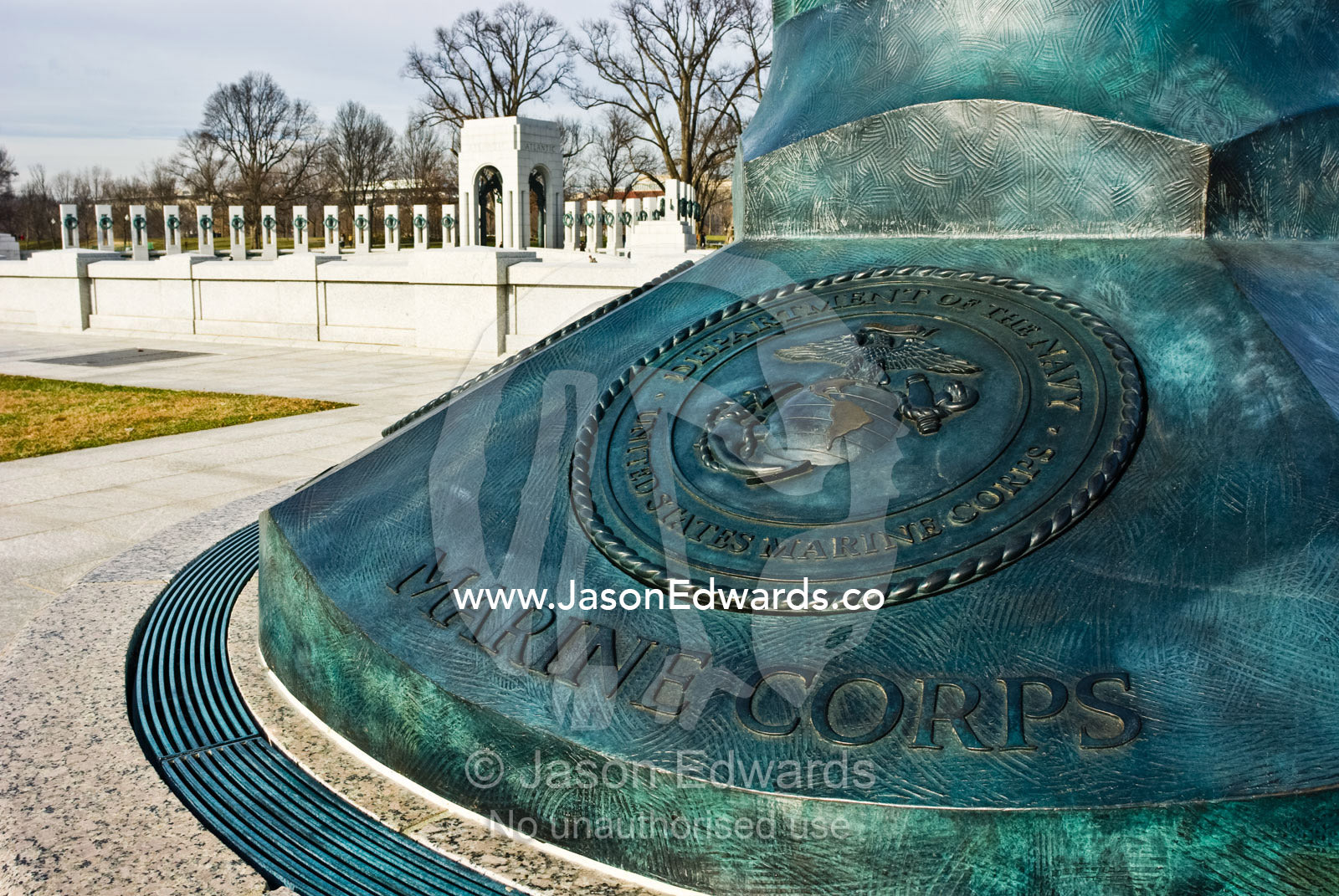 A bronze monument commemorates Marine Corp veterans of World War 2. World War II Memorial, National Mall, Washington, DC, United States of America.
