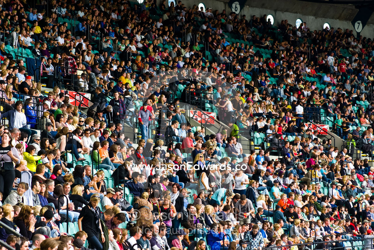 Crowds gather for a music festival to raise funds for bushfire relief. The MCG, Melbourne Cricket Ground, Melbourne, Victoria, Australia.