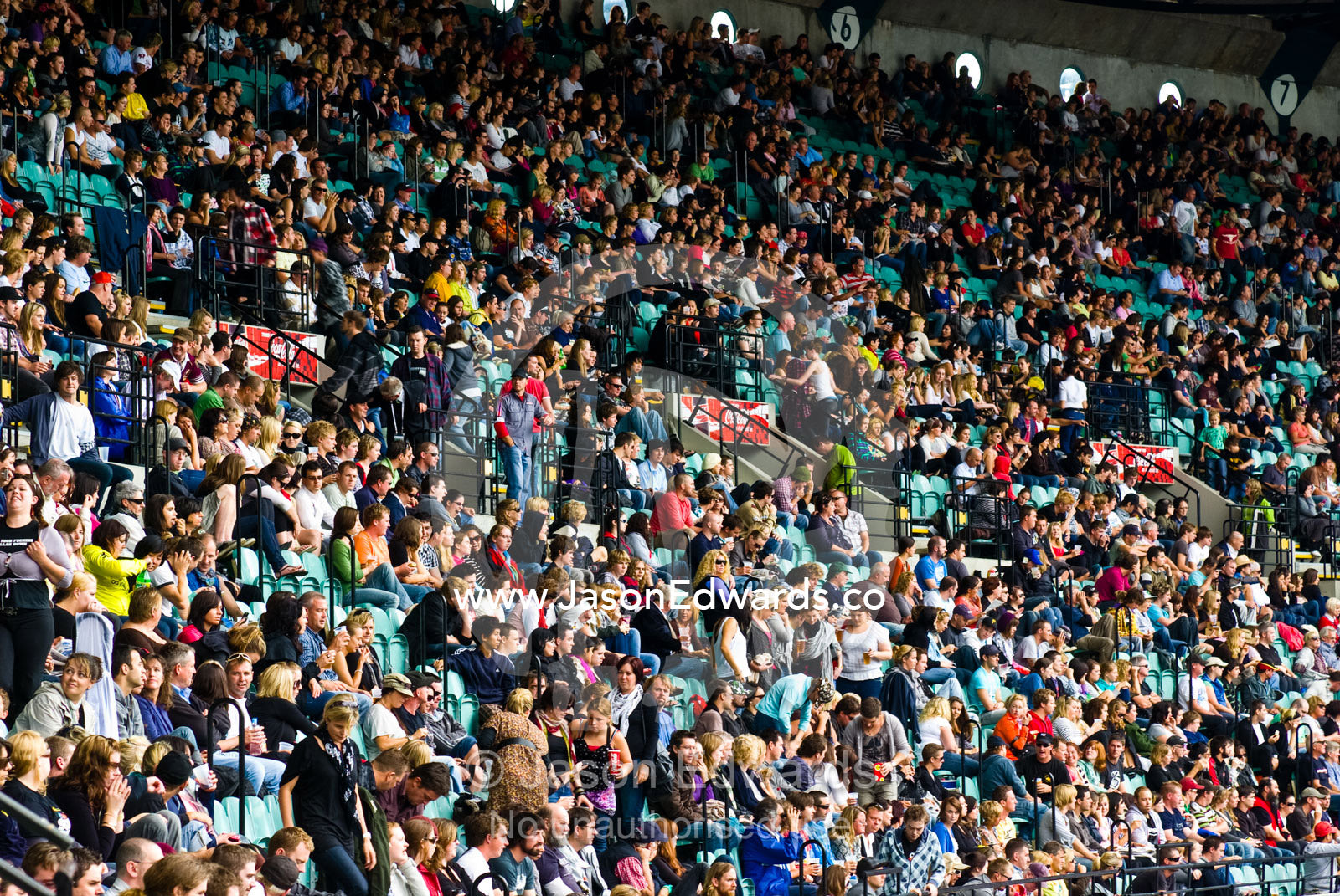 Crowds gather for a music festival to raise funds for bushfire relief. The MCG, Melbourne Cricket Ground, Melbourne, Victoria, Australia.