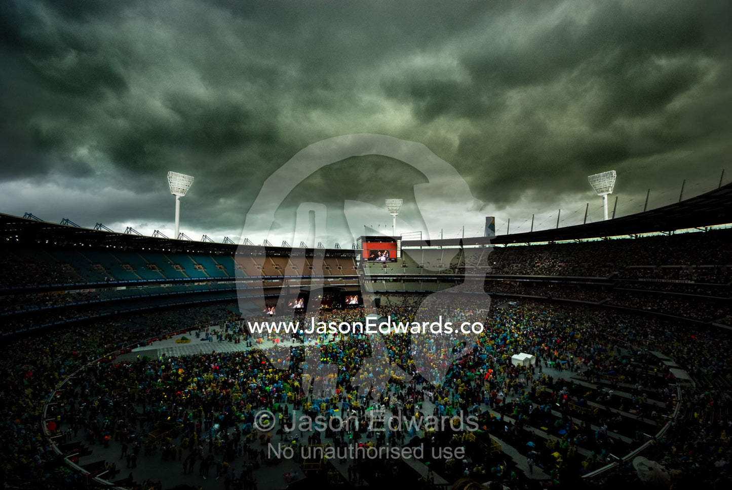Crowds gather for a music festival to raise funds for bushfire relief. The MCG, Melbourne Cricket Ground, Melbourne, Victoria, Australia.