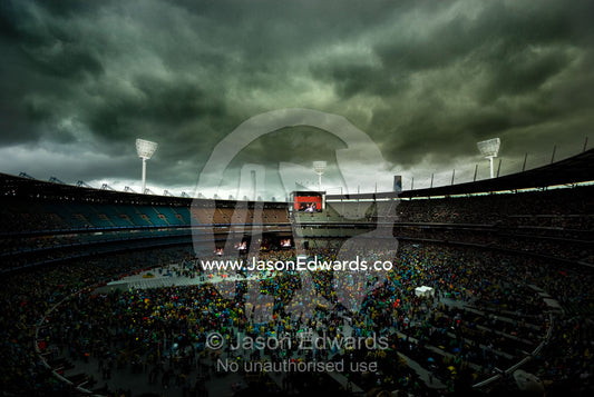 Crowds gather for a music festival to raise funds for bushfire relief. The MCG, Melbourne Cricket Ground, Melbourne, Victoria, Australia.