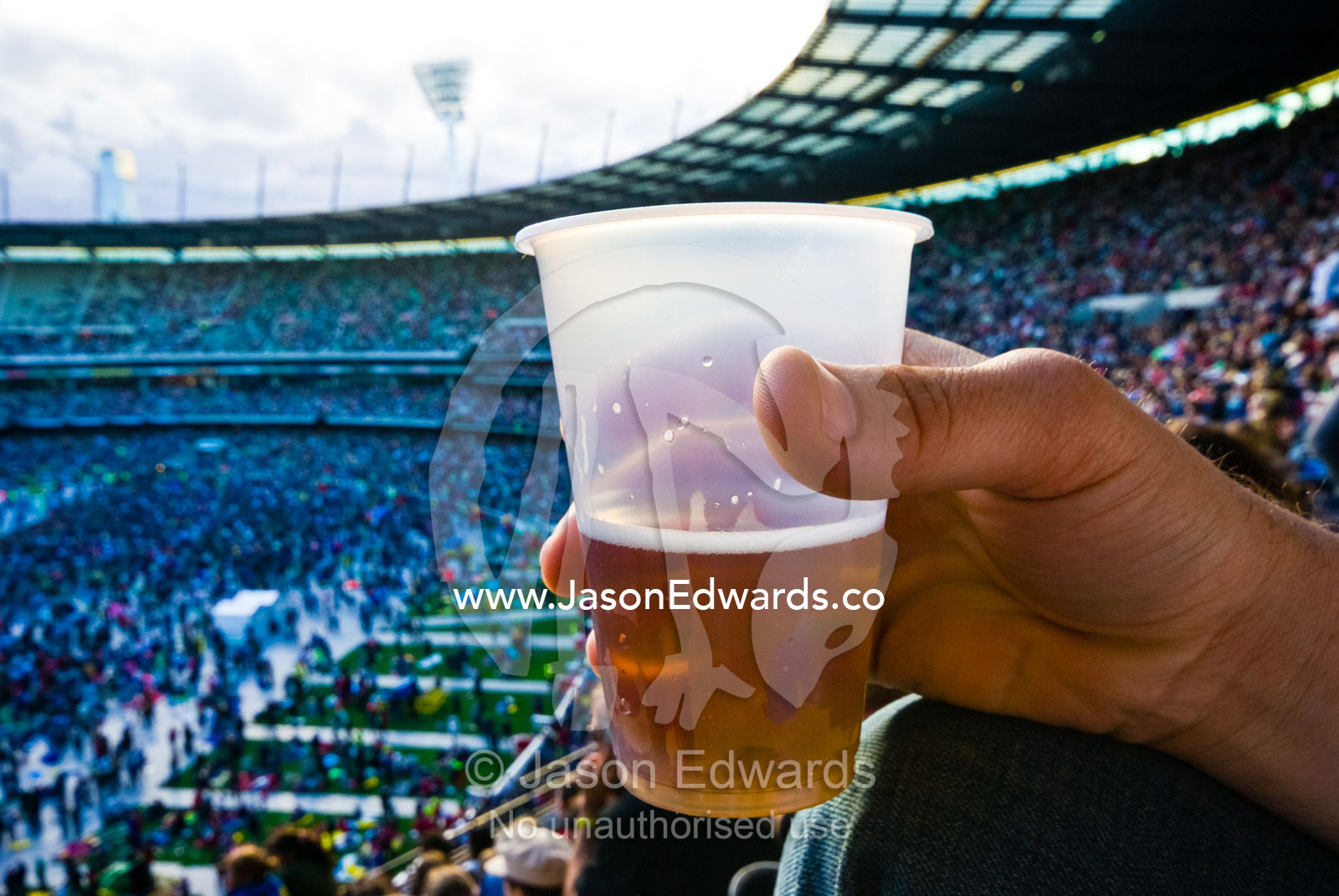 Beer consumed at a music festival to raise funds for bushfire relief. The MCG, Melbourne Cricket Ground, Melbourne, Victoria, Australia.