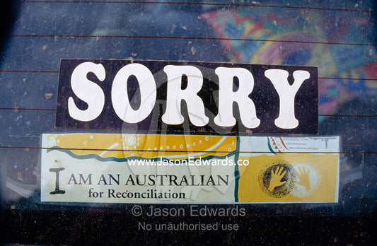 A car window sticker apologises for the state of Aboriginal affairs. National Archives of Australia, Canberra, ACT, Australian Capital Territory, Australia.