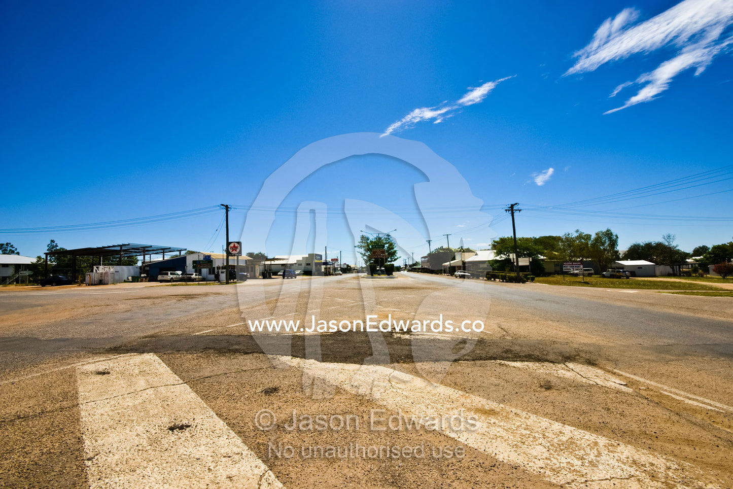 The empty main street of a remote Outback town during rush hour. Hughenden, Queensland, Australia
