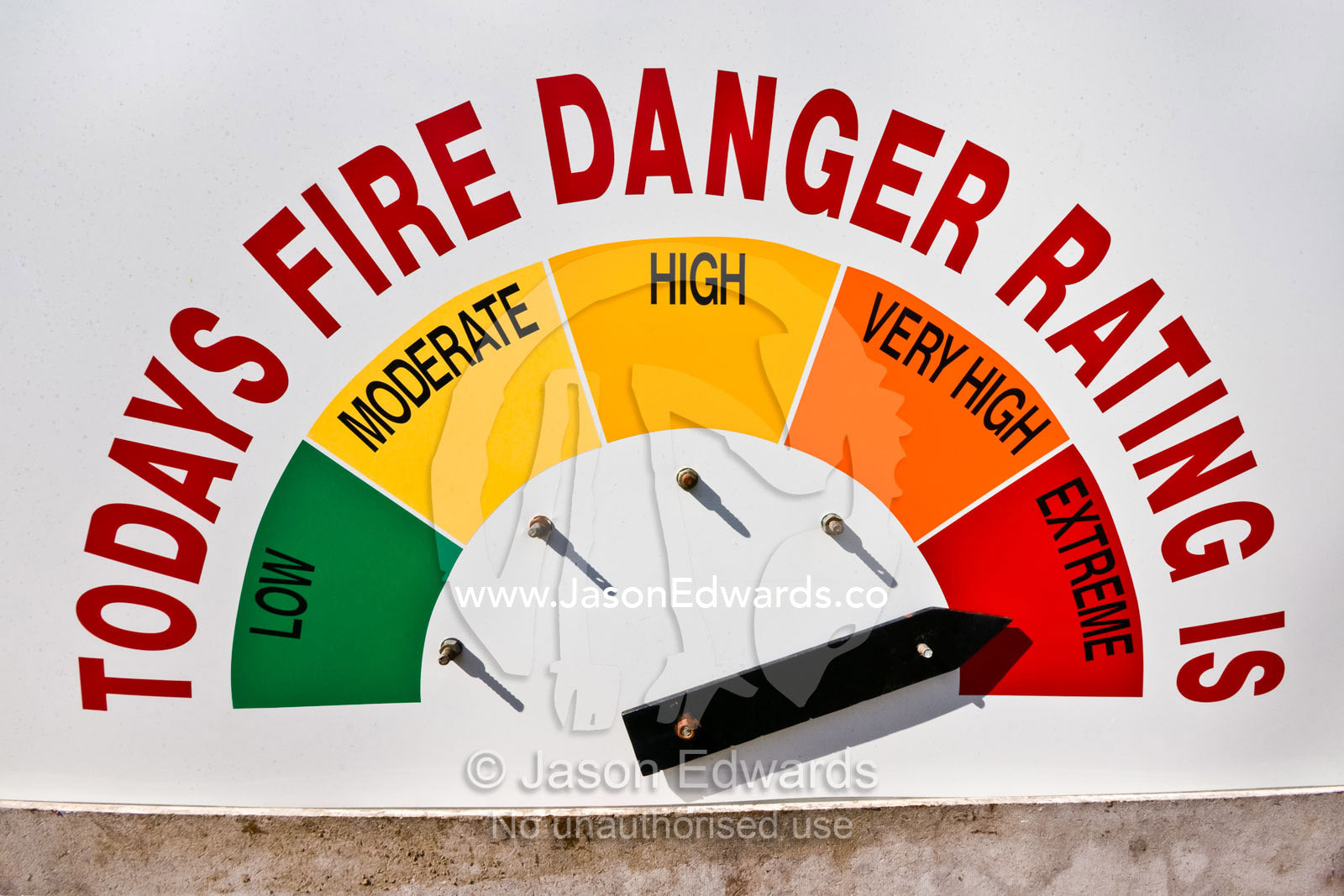 A warning sign in a rural town indicates the current fire threat. Molesworth, Victoria, Australia
