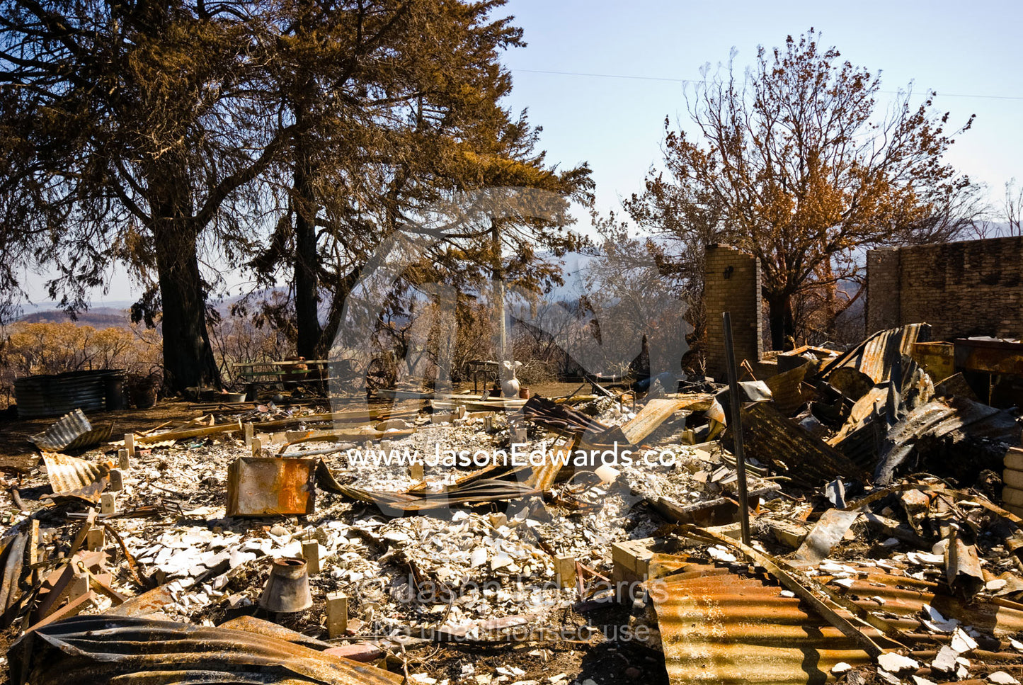 A farmhouse in ruins completely destroyed by the ravages of fire. Near Humevale, Kinglake National Park, Victoria, Australia