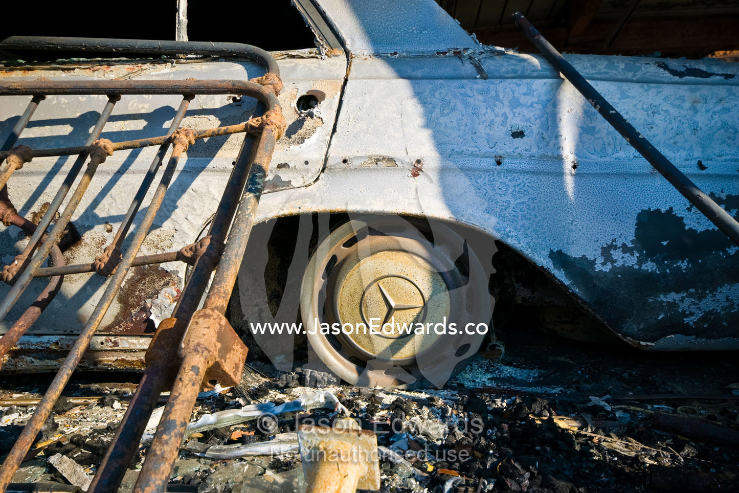 A family home destroyed by fire collapses in on the car garage below. Kinglake, Victoria, Australia