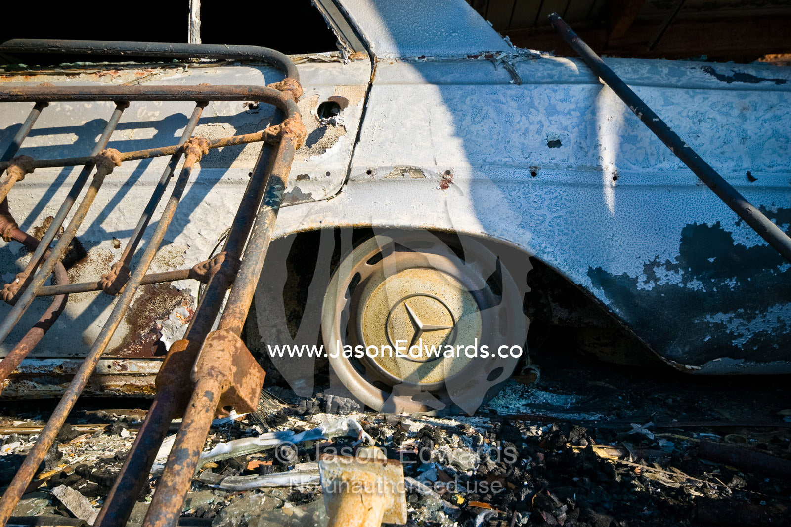 A family home destroyed by fire collapses in on the car garage below. Kinglake, Victoria, Australia