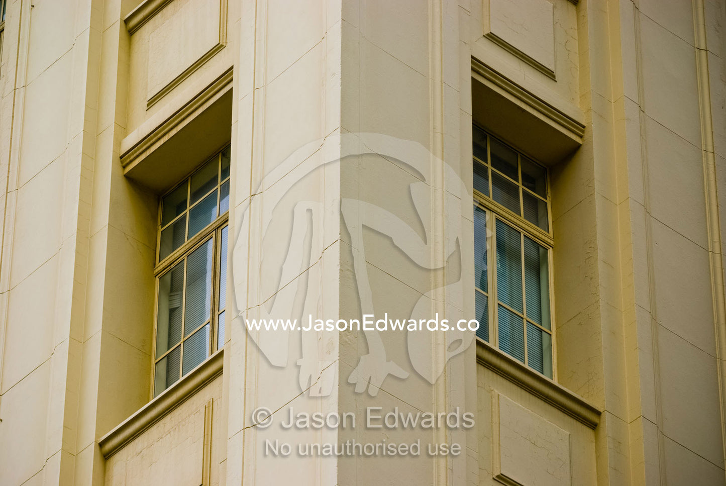 Corner windows in an Art Deco highrise apartment building in a city. Flinders Lane, Melbourne, Victoria, Australia