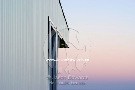 An architecturally designed wall and balcony made of corrugated steel. Ocean Grove, Victoria, Australia