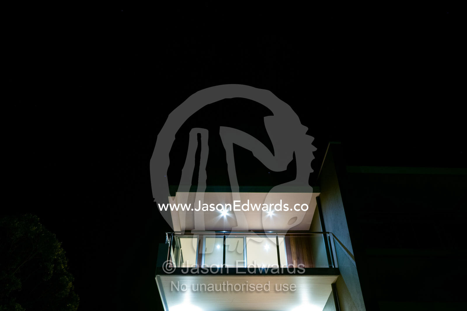 A balcony in a modern multi-storey beach house at night. Ocean Grove, Victoria, Australia