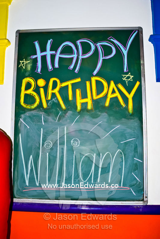 Birthday wishes written on a chalkboard in a childrens play centre. Hawthorn, Victoria, Australia