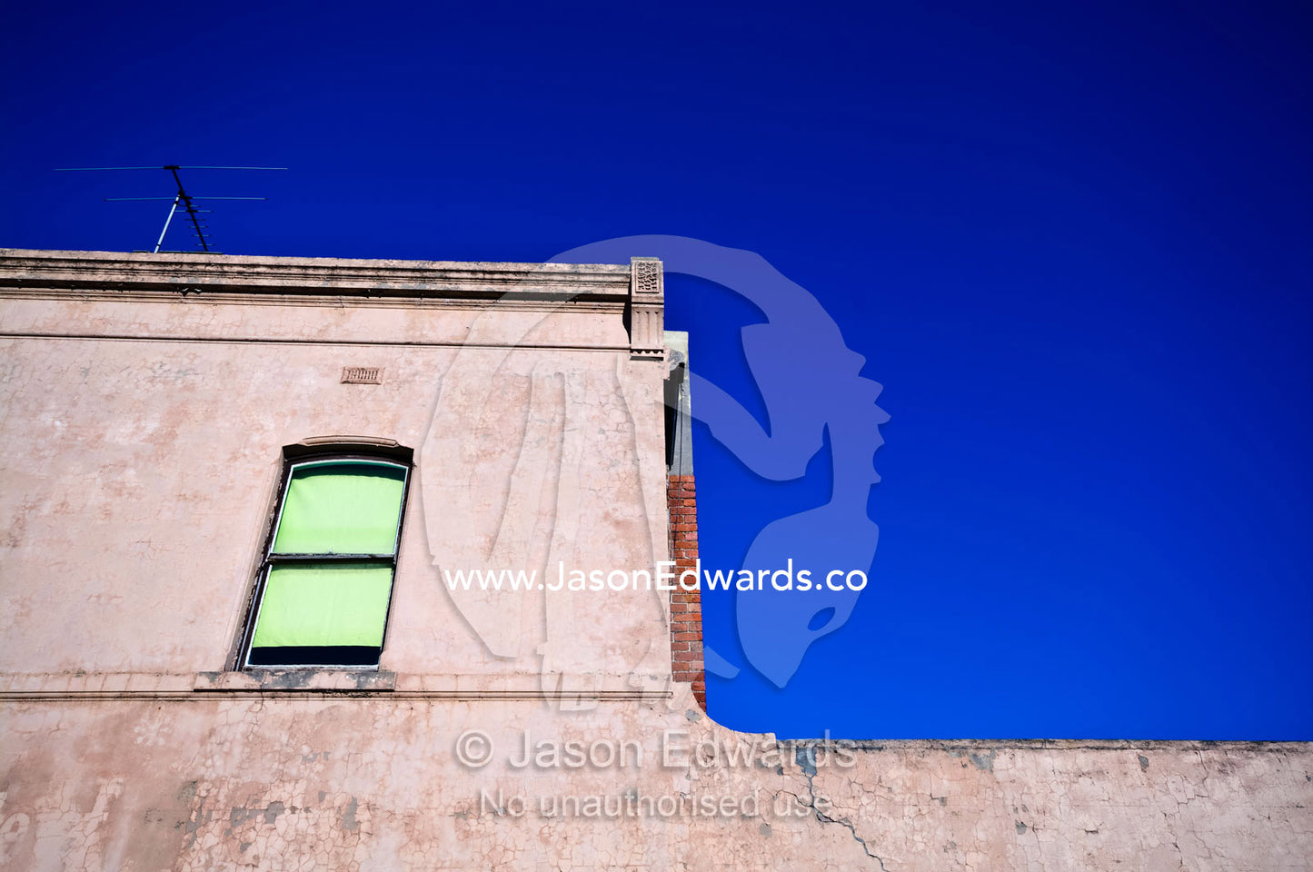 A window shuttered with a blind in an antique English terrace house. Carlton North, Victoria, Australia