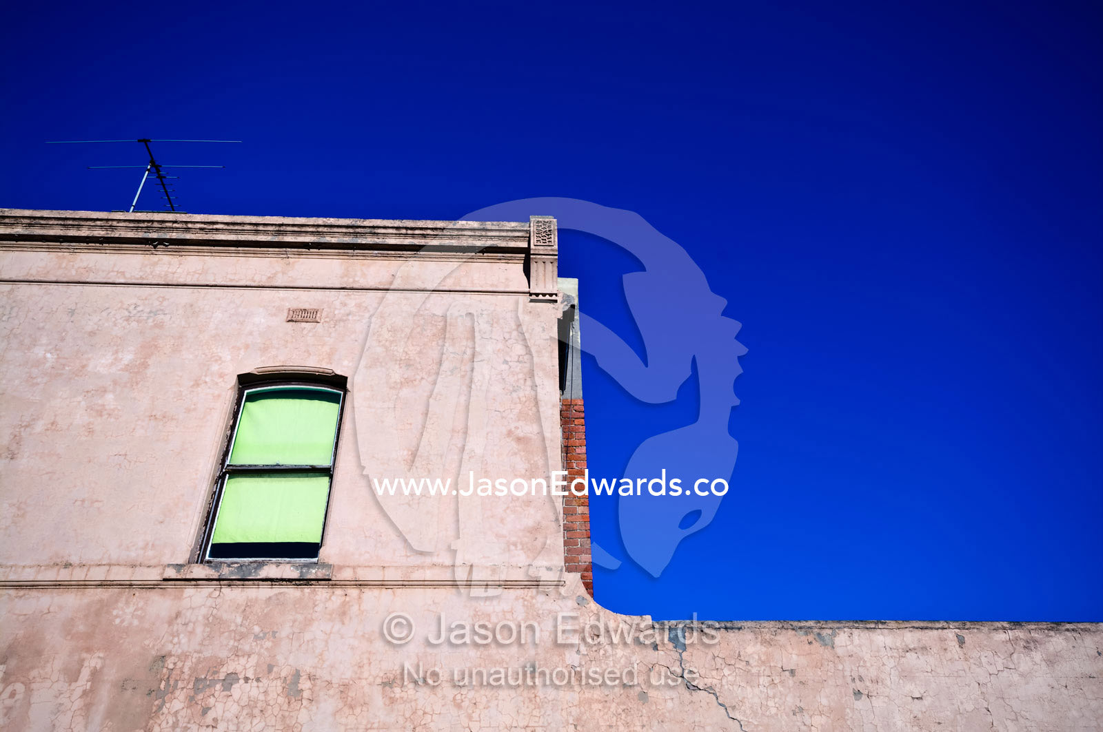 A window shuttered with a blind in an antique English terrace house. Carlton North, Victoria, Australia