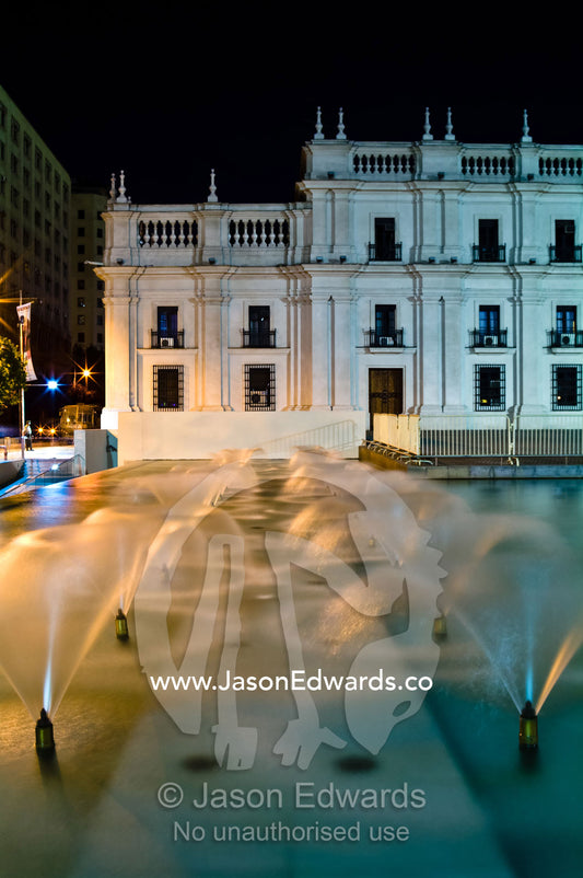 Fountains spray in a pool in Citizenry Square by Palacio de La Moneda. Plaza de la Ciudadan��a, Citizenry Square, Palacio de La Moneda, Palace La Moneda, Santiago, Chile