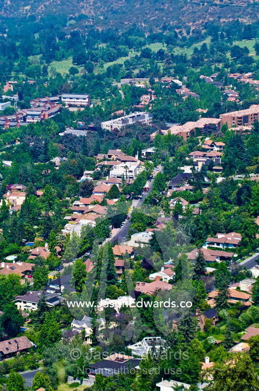 The tree-lined streets and large homes of a wealthy suburb in Santiago Santa Maria de Manquehue, Santiago, Chile
