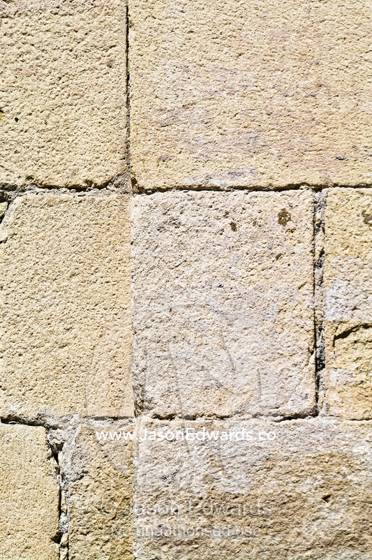 Detail of a stone wall at the entrance to an ancient Christian church. Iglesia San Francisco, Santiago, Chile
