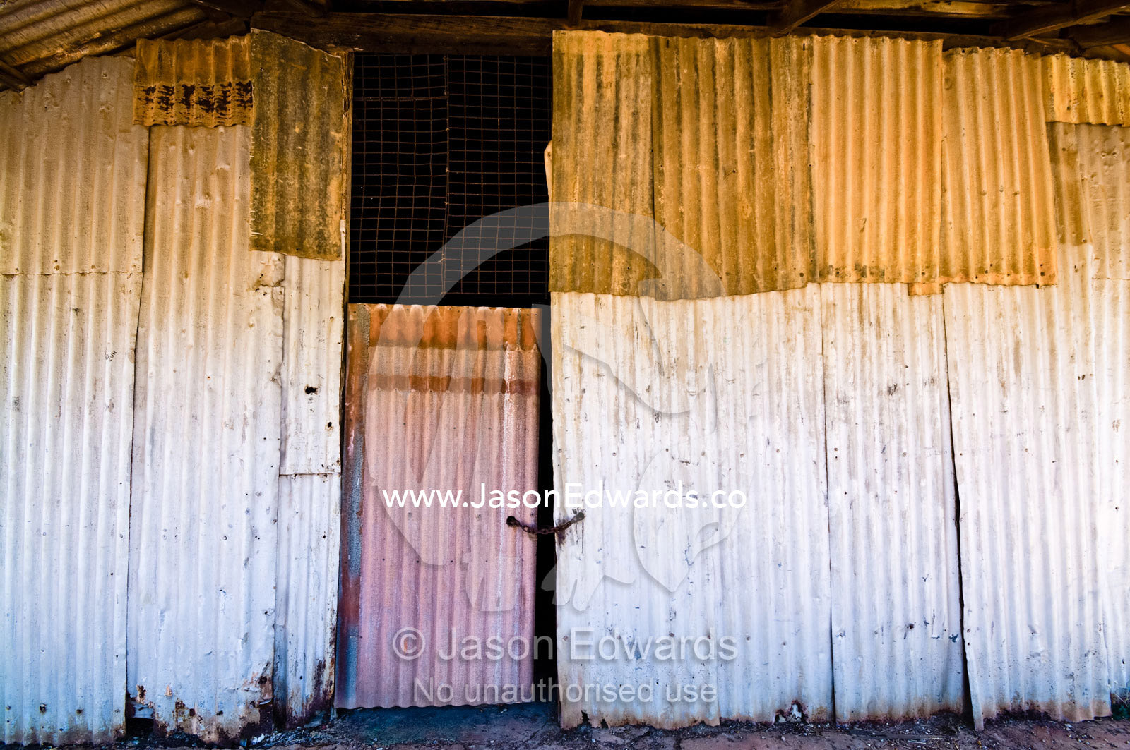 An antique Top End bakery door made of corrugated galvanised iron. Pine Creek, Northern Territory, Australia
