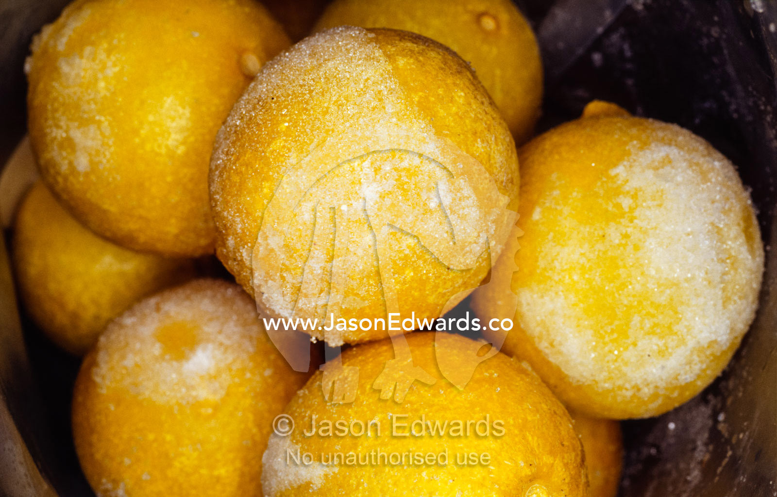 A bag of frozen yellow Wild Limes in a commercial store deep freeze. Sydney, New South Wales, Australia