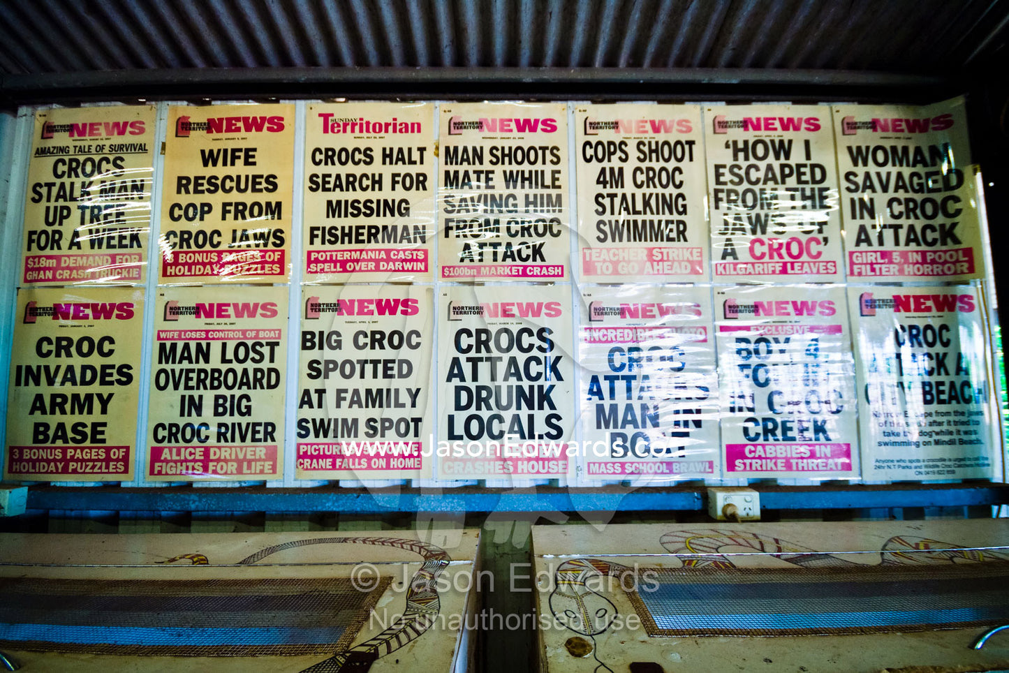 Top End newspaper bulletins proclaim crocodile attacks on people. Adelaide River, Northern Territory, Australia.