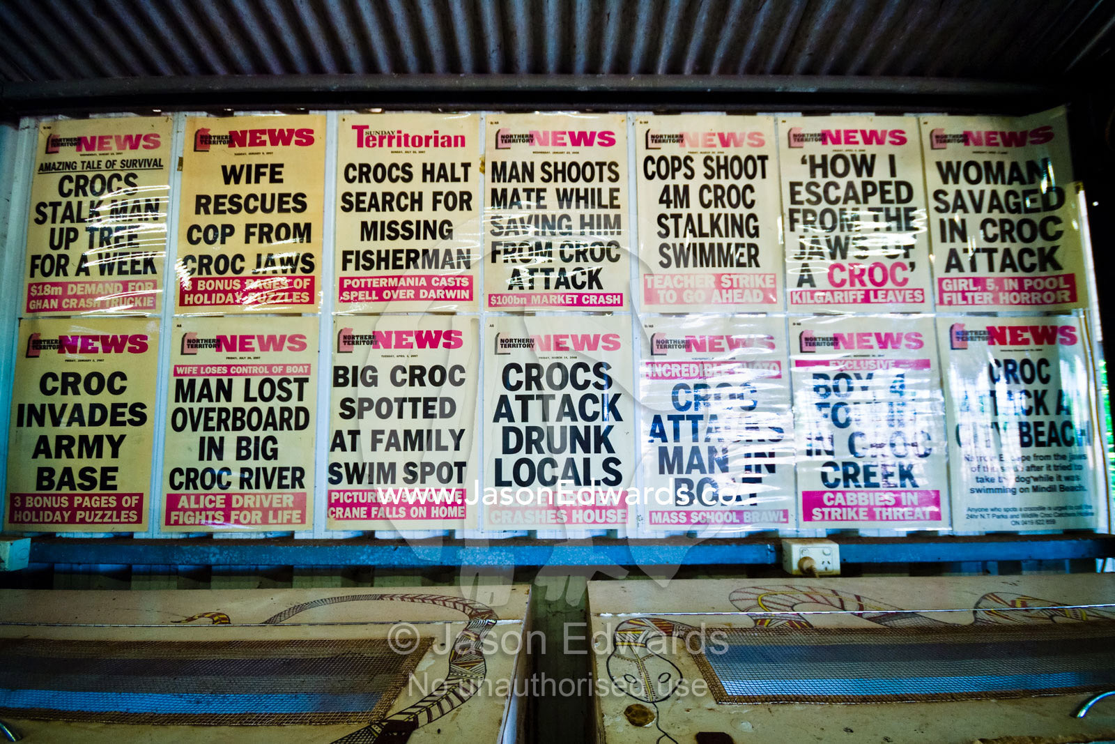 Top End newspaper bulletins proclaim crocodile attacks on people. Adelaide River, Northern Territory, Australia.