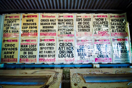 Top End newspaper bulletins proclaim crocodile attacks on people. Adelaide River, Northern Territory, Australia.