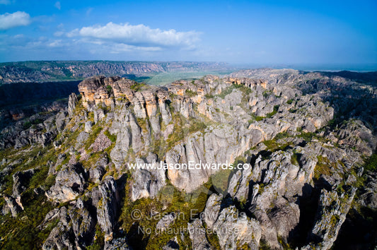Weathered rugged and deep sandstone gorges beneath an ancient plateau. Dinosaur Valley, Arnhem Land Border, Kakadu National Park, Northern Territory, Australia.
