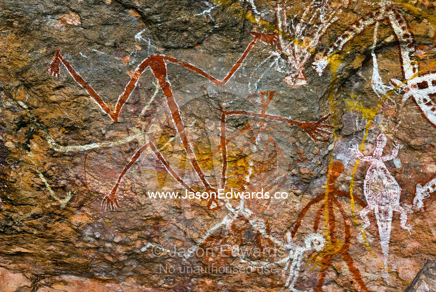 Aboriginal rock art depicts figures of Mimi Spirits on a cave wall. Nourlangie, Nawurlandja, Anbangbang Billabong, Kakadu National Park, Northern Territory, Australia.