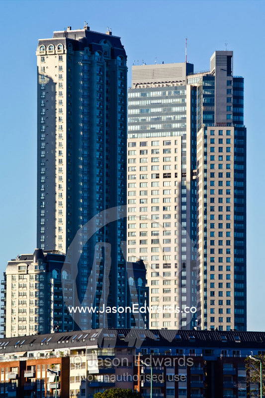 Modern highrise apartment towers rise into a clear blue sky. Puerto Madero, Buenos Aires, Argentina.