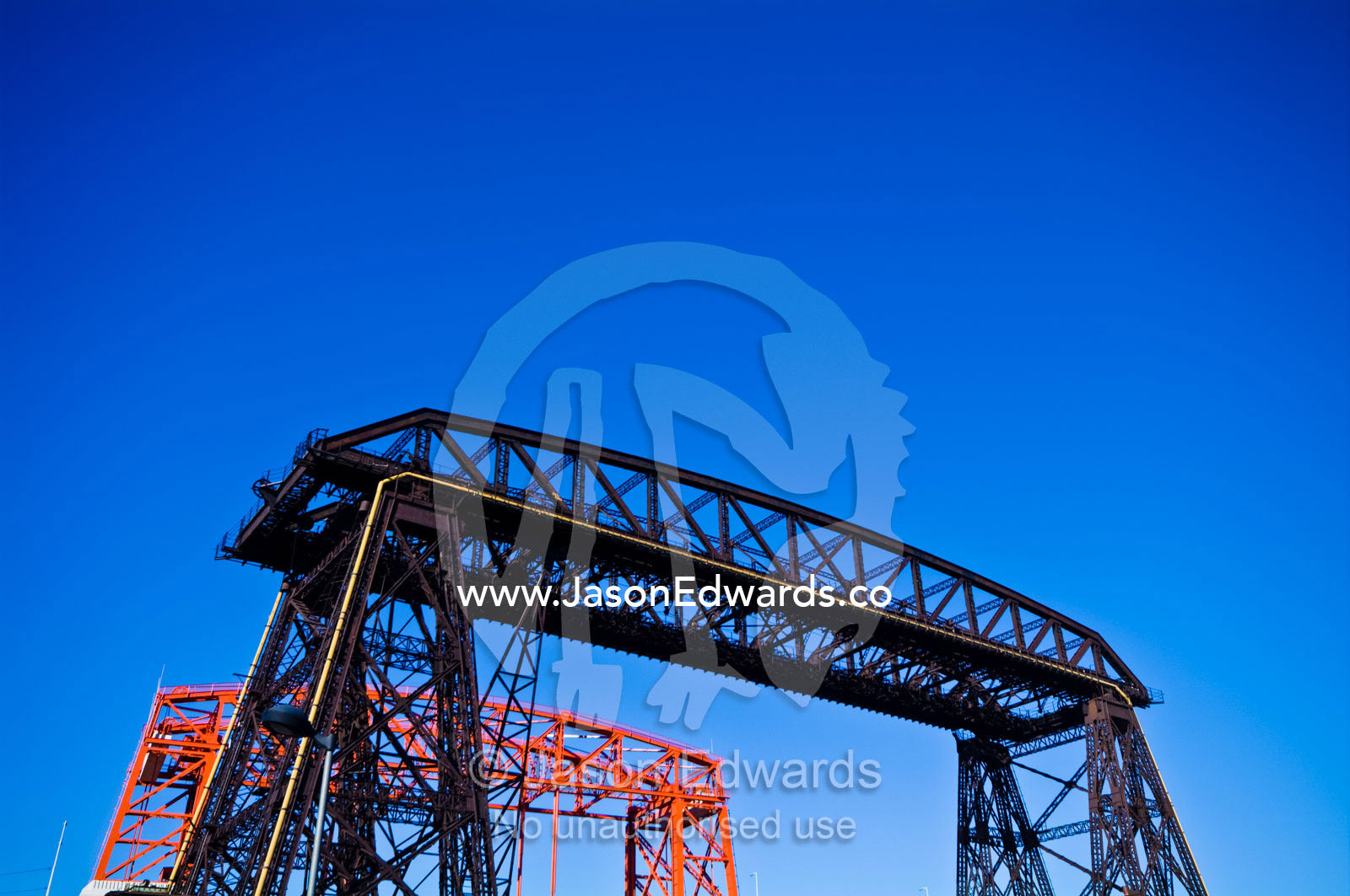 Two river bridges, a Transporter Bridge and a Railroad Lift Bridge. Rocha Bend, Riachuelo River, La Boca, Buenos Aires, Argentina.