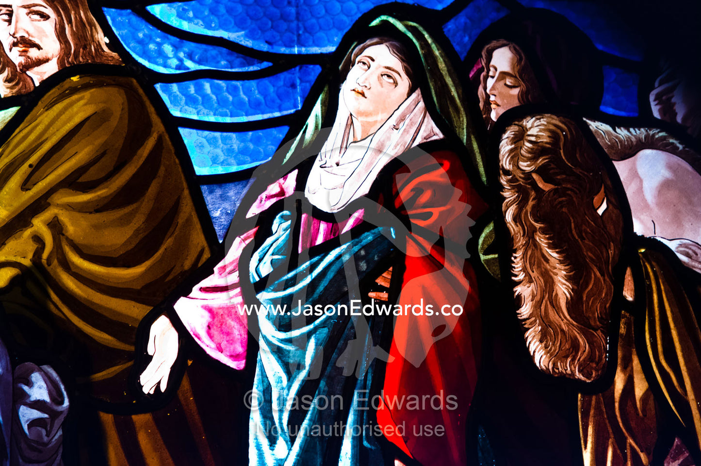 A stain glass window in a mausoleum depicts the Virgin Mary and Christ La Recoleta Cemetery, Recoleta, Buenos Aires, Argentina.