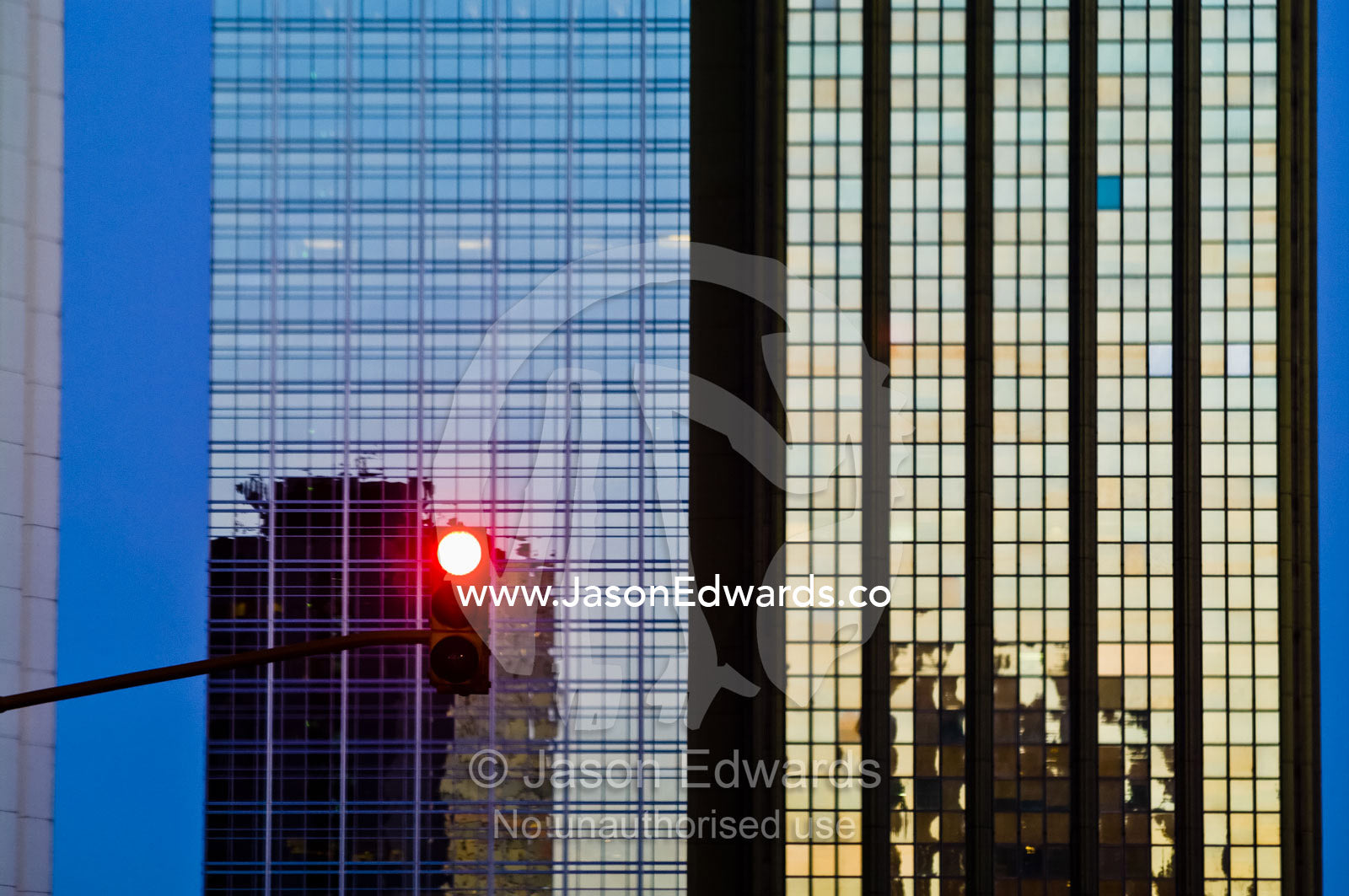 A red traffic light signal in a city's central business district, CBD. Puerto Madero, Buenos Aires, Argentina.