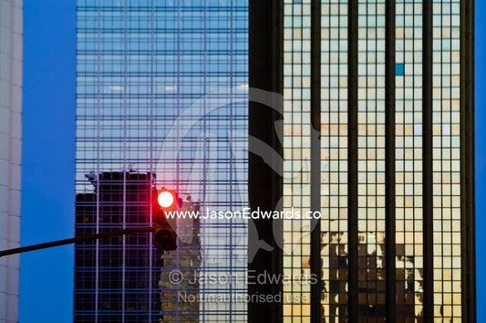 A red traffic light signal in a city's central business district, CBD. Puerto Madero, Buenos Aires, Argentina.