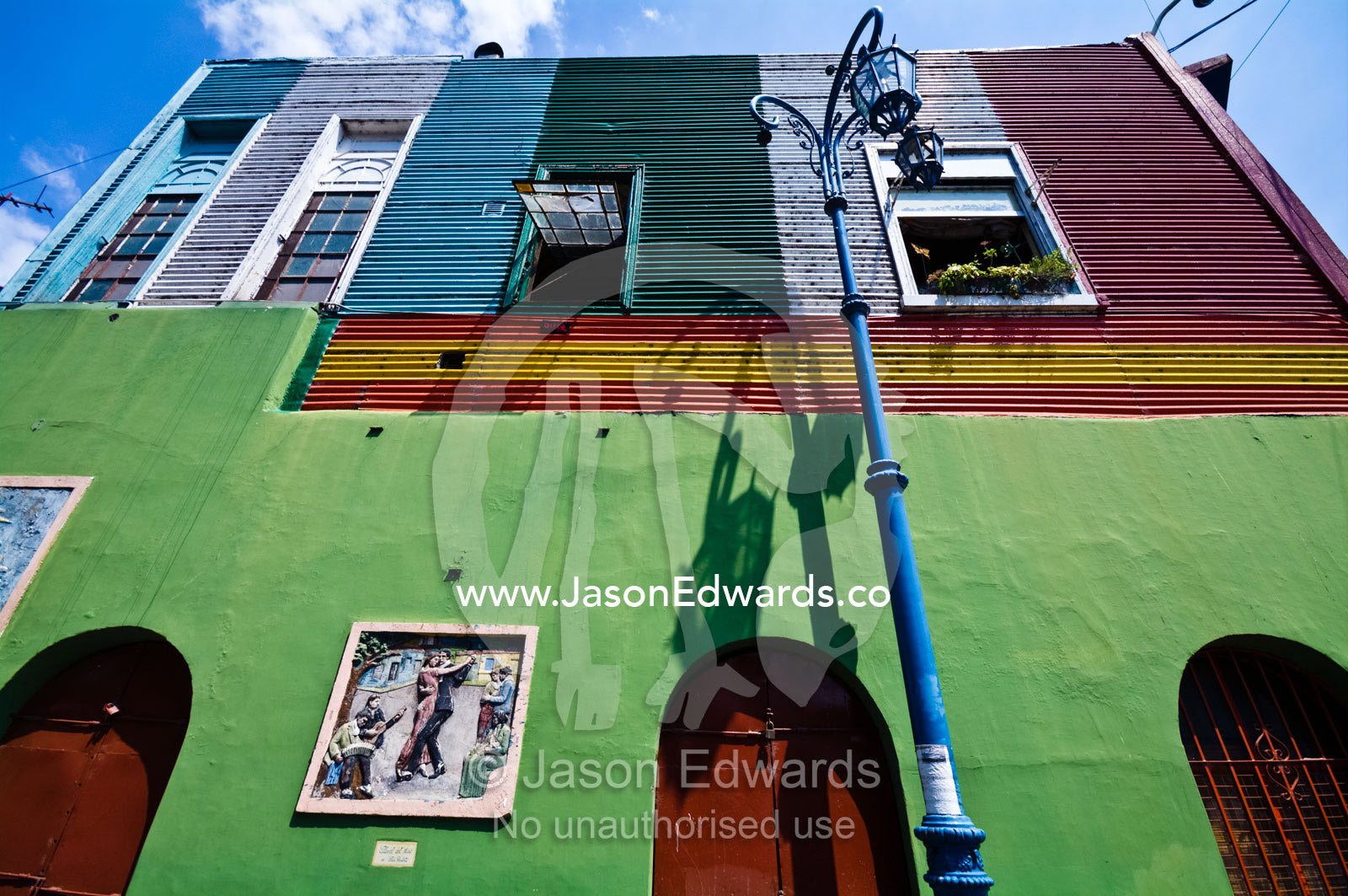 The colorful facade of a suburban house in a portside artists' colony. El Caminito, La Boca, Buenos Aires, Argentina.