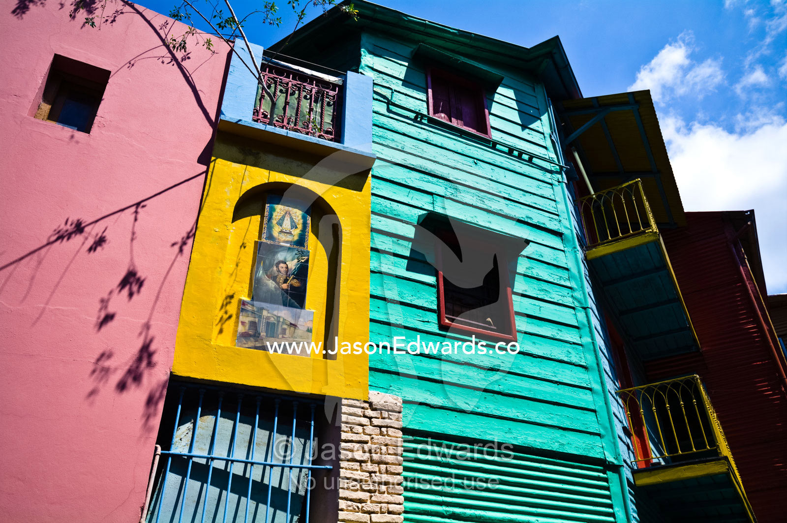 The colorful facade of a suburban house in a portside artists' colony. El Caminito, La Boca, Buenos Aires, Argentina.