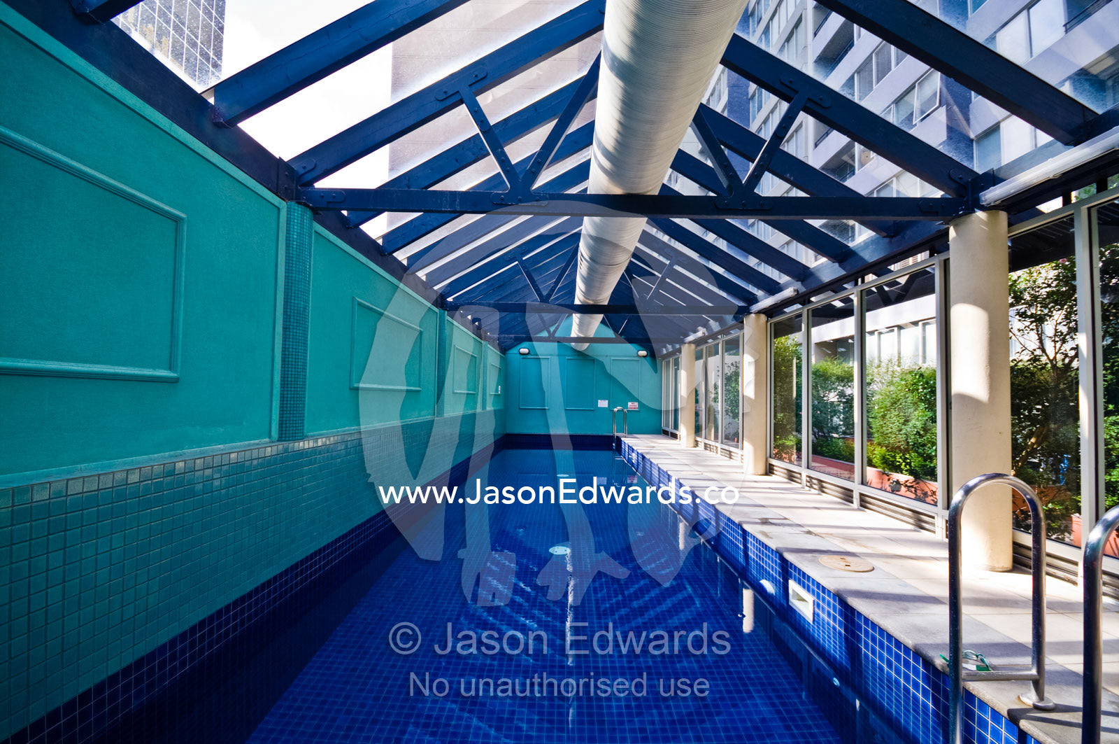 A private swimming pool in an inner city apartment complex. St Kilda Road, Melbourne, Victoria, Australia.