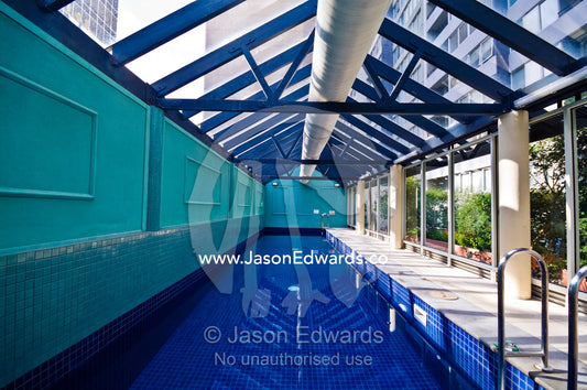 A private swimming pool in an inner city apartment complex. St Kilda Road, Melbourne, Victoria, Australia.