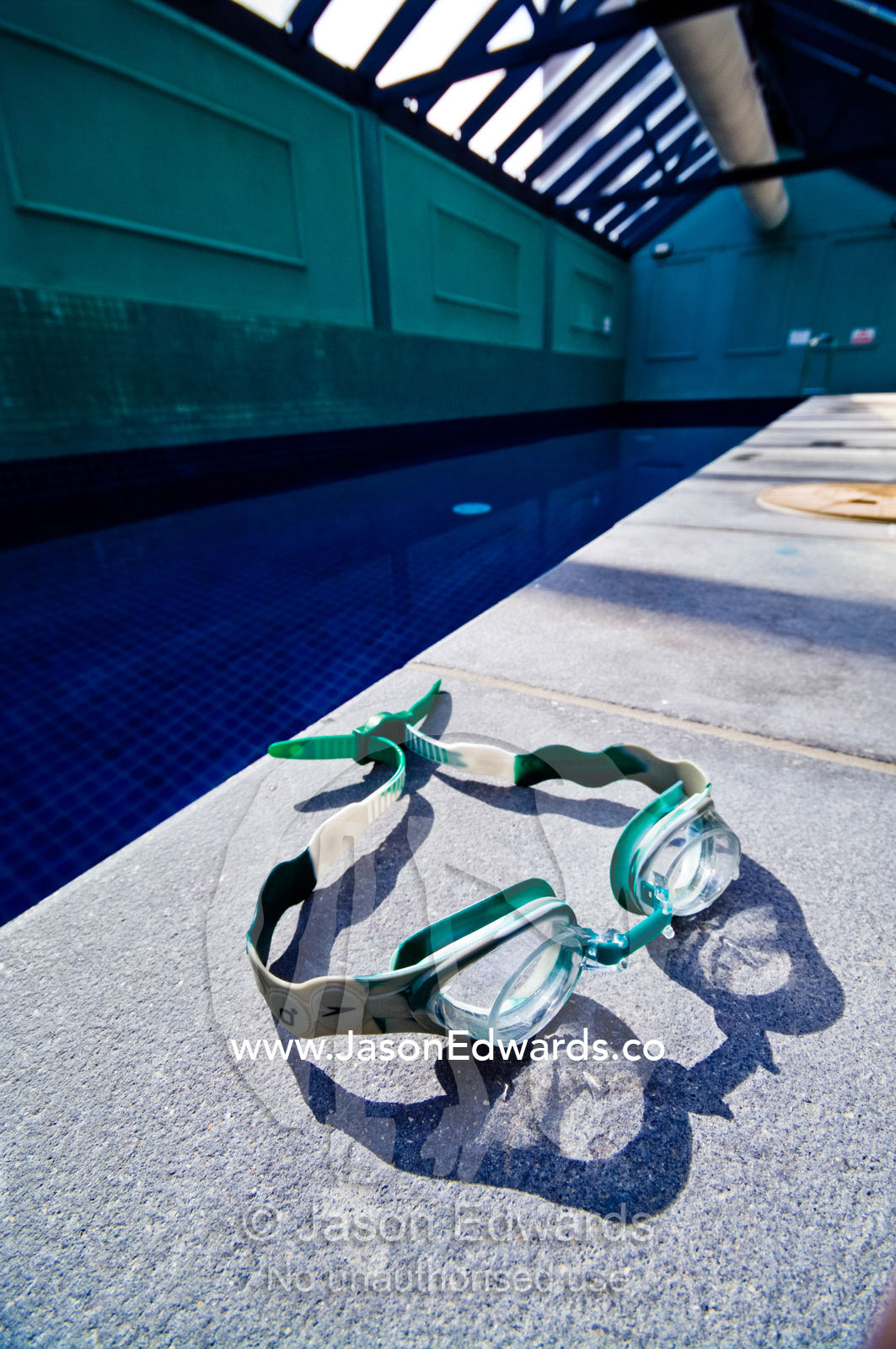 Swimming goggles in a private swimming pool in an apartment complex. St Kilda Road, Melbourne, Victoria, Australia.